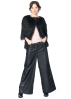 ULI SCHNEIDER, glazed baggy pants with flared cut and pockets