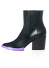 Paloma Barceló, black leather boots BEA with purple detail