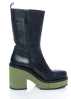 Paloma Barceló, black boots BROOK with green platform heel