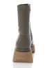 Paloma Barceló, platform boot OSIAN in olive